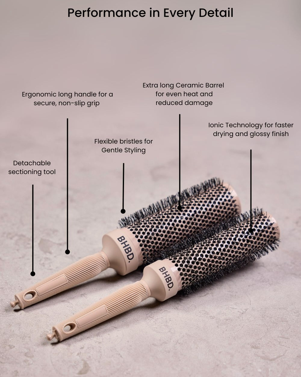 wo BHBD round brushes placed on a neutral surface, highlighting their ergonomic long handles, detachable sectioning tools, ceramic barrels, flexible bristles, and ionic technology for professional styling and reduced frizz.